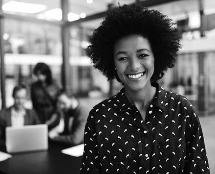 student smiling at the camera